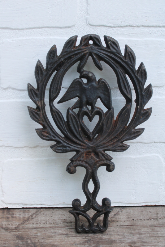 photo of vintage John Wright cast iron trivet wall hanging, American eagle & heart w/ laurel wreath  #1