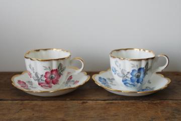 catalog photo of vintage Kent bone china tea cups & saucers wild rose pattern, one pink & one blue 
