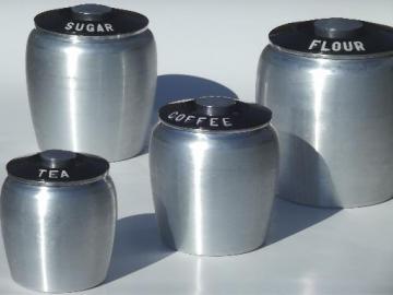 catalog photo of vintage Kromex spun aluminum canister set, retro kitchen canisters