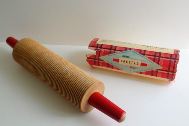 photo of vintage Lokstad label lefse rolling pin, ribbed maple hard wood w/ red handles #7