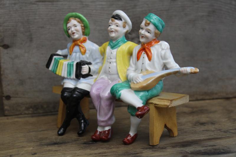 photo of vintage Made in Japan hand painted figurine, jolly sailors band shelf sitter w/ wood bench #7