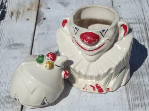 photo of vintage McCoy pottery cookie jar, white glaze clown w/ handpainted face #5