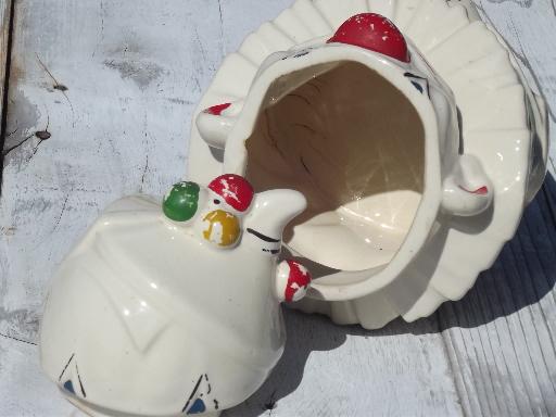 photo of vintage McCoy pottery cookie jar, white glaze clown w/ handpainted face #6