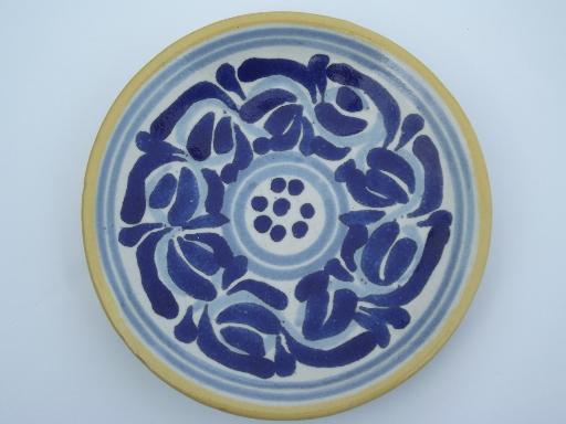 photo of vintage Mexican pottery plates, old blue and white handpainted redware #2