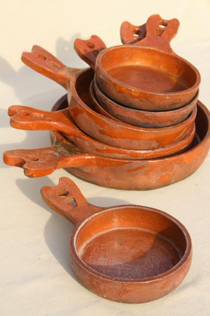 photo of vintage Mexican pottery pots, rustic terracotta clay pans in nesting sizes #1