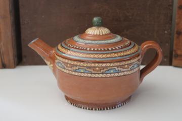 catalog photo of vintage Mexican pottery teapot, Aztec style hand painted border terracotta red clay 