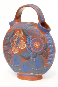 catalog photo of vintage Mexican pottery water bottle or wine jug, terracotta w/ hand painted flowers cobalt blue