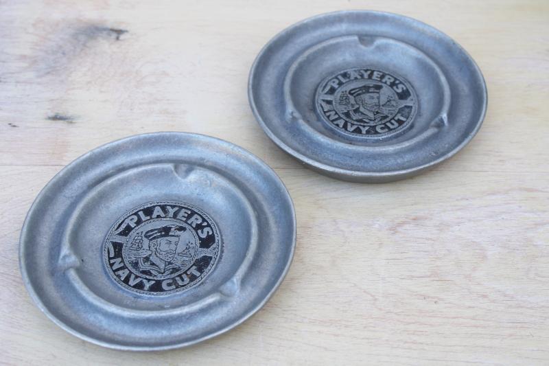 photo of vintage Player's Navy Cut advertising ashtrays, cast metal w/ hero sailor design #1