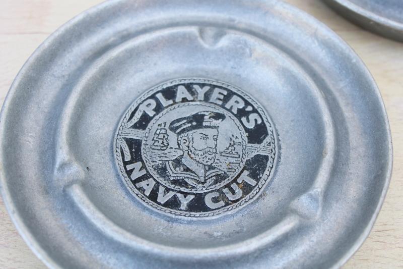 photo of vintage Player's Navy Cut advertising ashtrays, cast metal w/ hero sailor design #2