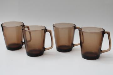 catalog photo of vintage Pyrex Fireside mugs set of four, clear amber brown glass Visions Corning 