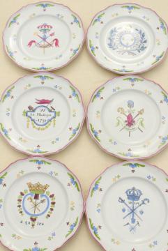 catalog photo of vintage Saint Amand French faience pottery plates, hand painted coat of arms