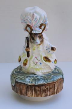 catalog photo of vintage Schmid music box Beatrix Potter china figurine Hunca Munca plays Hello Dolly 