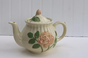 catalog photo of vintage Shawnee USA pottery teapot, embossed pink rose flower tea pot