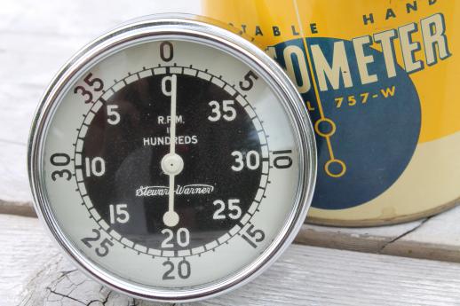 photo of vintage Stewart Warner 757W hand tachometer in tin case, 1940s garage or racing pit #4