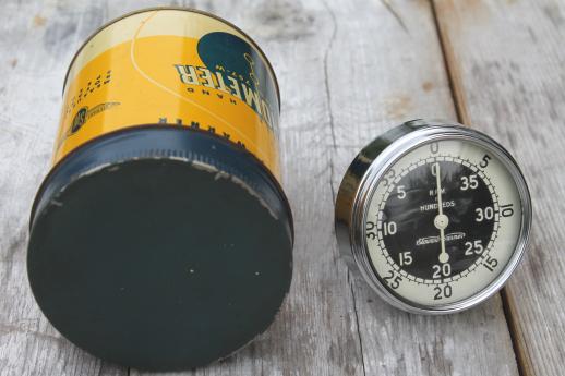 photo of vintage Stewart Warner 757W hand tachometer in tin case, 1940s garage or racing pit #10