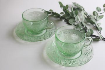 catalog photo of vintage Tiara chantilly green glass cups & saucers, sandwich daisy pattern 