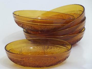 catalog photo of vintage Tiara sandwich glass soup bowls, daisy pattern amber glass 