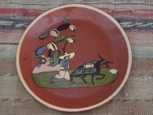 photo of vintage Tlaquepaque Mexican painted pottery plates, one black, one red #2