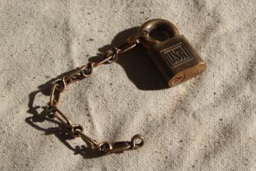 catalog photo of vintage US Navy padlock with chain / no key, USN Yale lock bronze red brass