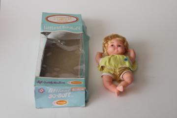 catalog photo of vintage Uneeda baby doll, blonde bubble cut hair, soft body little doll in orig pkg 1970s 