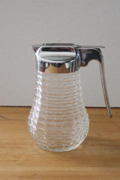 catalog photo of vintage WMF Germany syrup pitcher, drip cut style chrome lid w/ glass beehive jar