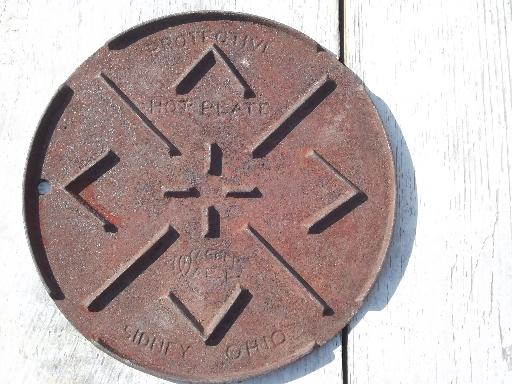 photo of vintage Wagner ware cast iron, old round trivet #1309 #1