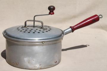 catalog photo of vintage West Bend corn popper hand crank stovetop popcorn maker w/ wood handle