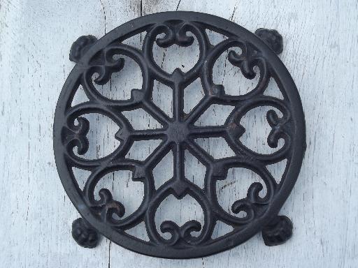 photo of vintage Wilton cast iron kitchen trivets, round and iron shape trivet lot #3