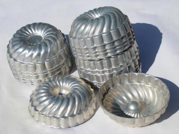 catalog photo of vintage aluminum individual gelatin molds, jello ring mold lot of 16