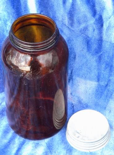 photo of vintage amber glass Duraglas medicine/druggist jar w/old zinc mason jar lid #2