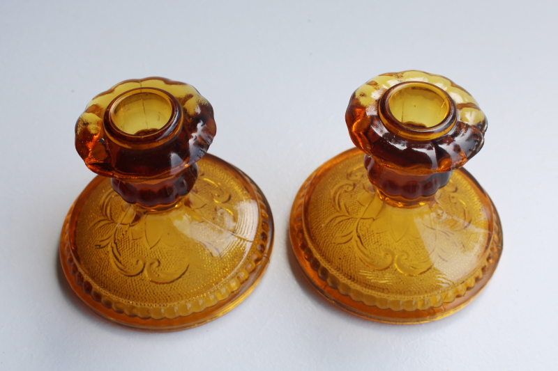 photo of vintage amber glass candle holders, pair low candlesticks, Tiara / Indiana sandwich daisy pattern #1