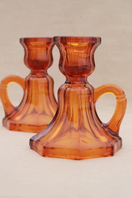 photo of vintage amber glass candle holders, small low chamber candlesticks w/ ring handles #1