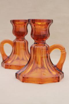 catalog photo of vintage amber glass candle holders, small low chamber candlesticks w/ ring handles