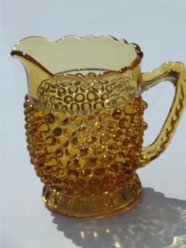 catalog photo of vintage amber glass hobnail pattern milk pitcher or large creamer