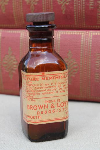 photo of vintage amber glass medicine bottle, tincture of merthiolate pre mercurochrome label #1