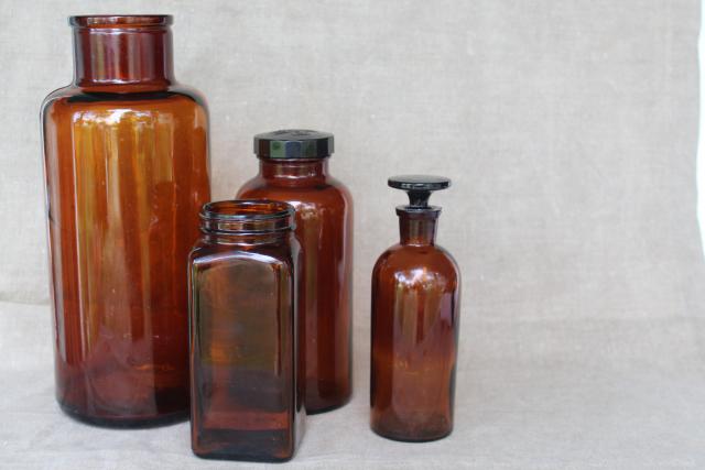 photo of vintage apothecary bottles & jars, industrial style decor, amber brown glass bottle lot #1