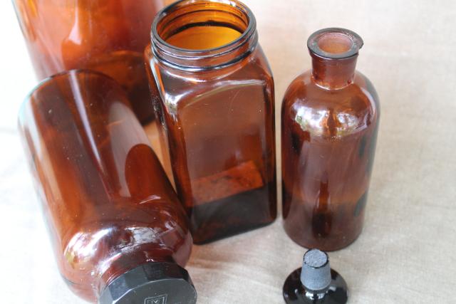 photo of vintage apothecary bottles & jars, industrial style decor, amber brown glass bottle lot #3