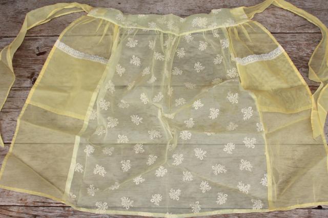 photo of vintage apron lot, kitchen aprons all retro fabric, pretty prints in yellow, green, blue #6