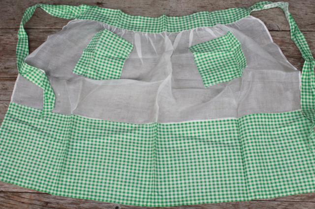 photo of vintage apron lot, kitchen aprons all retro fabric, pretty prints in yellow, green, blue #7