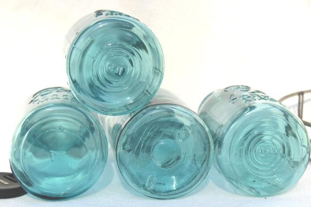 photo of vintage aqua blue glass canning jars in old wire rack, Ball Mason jars w/ zinc lids #2