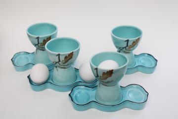 catalog photo of vintage aqua blue glazed ceramic egg cups w/ trays to hold eggs, set of four