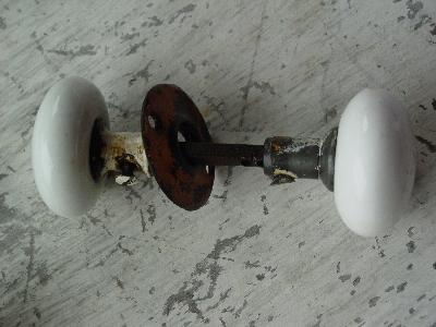 photo of vintage architectural doorknobs, white porcelain #2