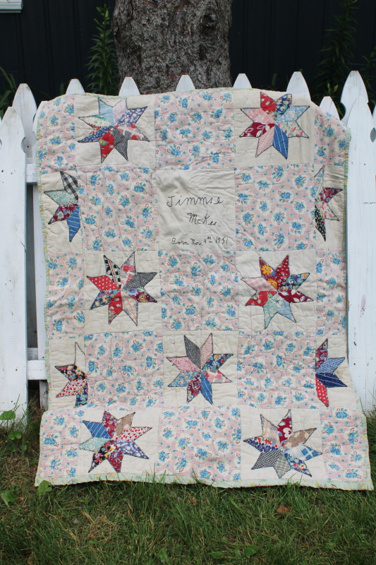 photo of vintage baby quilt signed dated 1951, primitive patchwork stars cotton feedsack prints #1