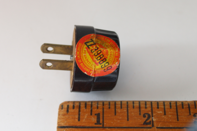 photo of vintage bakelite electrical plug w/ paper seal City of Los Angeles Dept of Building & Safety  #1