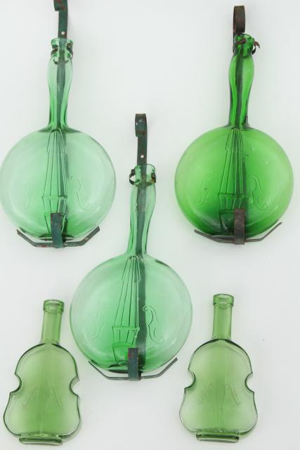 photo of vintage banjo & violin bottles, old green glass figural bottle collection #1