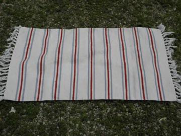 catalog photo of vintage barn red / indigo blue woven stripe fringed cotton throw rug