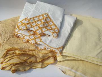 catalog photo of vintage bed linens, cotton pillowcases and sheets, matching gold bedspread