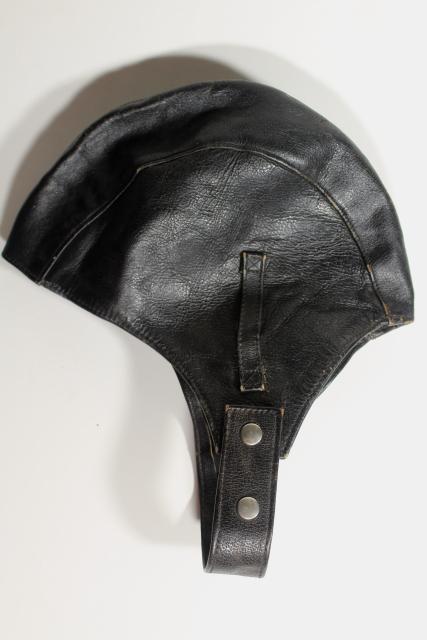 photo of vintage black leather helmet soft cap, retro mid-century biker motorcycle gear #1