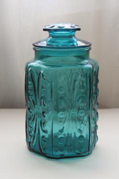 catalog photo of vintage blue glass canister jar, scroll pattern aqua or teal colored glass
