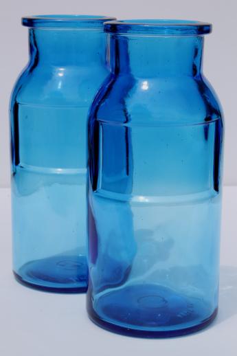 photo of vintage blue glass canister jars, apothecary jar type Wheaton bottles #1